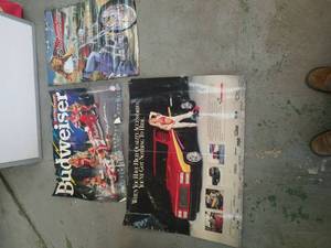 lot 212 image: two Budweiser posters and in the poster in rough condition