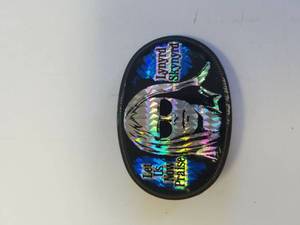 lot 808 image: Lynyrd Skynyrd belt buckle