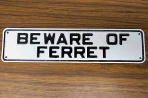 lot 524 image: Beware of Ferret Metal Sign