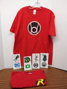 lot 563 image: Appears New Green Lantern & Robin  Logo Shirts  Both Size Large  Bonus 5 Super Hero Stickers