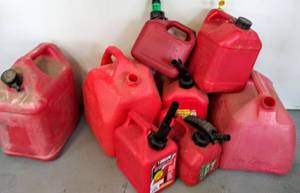 lot 565 image: Lot of 8  Different Size Gas Cans