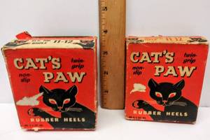 lot 590 image: Vintage Lot of 2 Pairs of Cats Paw Rubber Heels in Box & Shoe Laces