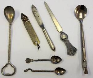 lot 601 image: Old Silver Plated Collectible Utensils  Kansas Advertisement & More