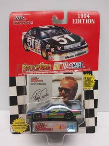lot 544 image: 1994 NASCAR Racing Champions  Ricky Craven #2 Dupont Chevy Monte Carlo  164th Diecast w Collectors Card and Display Stand