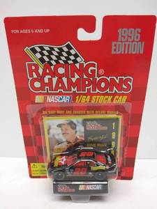 lot 551 image: Racing Champions 164 Scale Diecast with Deluxe Wheels  1996 Edition  #28 Ernie Irvan