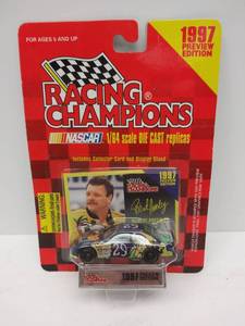 lot 554 image: Racing Champions 164 Scale Diecast w Collector Card & Display Stand  1997 Preview Edition  #29 Robert Pressley