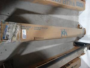 lot 2695 image: VPI Cappuccino 4 x 48 x  Vinyl Wall Base, Approx 47 Pieces