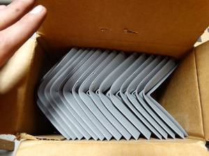 lot 2720 image: FLEXCO Rubber Floor Wall Base Corner Molding, Approx 30