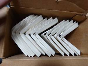 lot 2721 image: FLEXCO Rubber Floor Wall Base Corner Molding, Almond , Approx 17