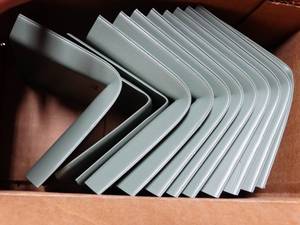 lot 2722 image: FLEXCO Rubber Floor Wall Base Corner Molding, Vizcaya Palm , Approx 13 Pieces