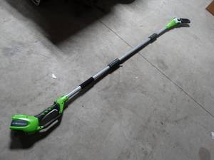 lot 2968 image: Green Works cordless pole saw  No Battery