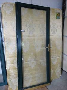 lot 8912 image: Glass Storm Door 32x79