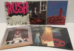 lot 9581 image: 6 Vintage RUSH Albums Their 1974 Debut Album,  Hemispheres, Exit Stage Left, 2112 & 2 More
