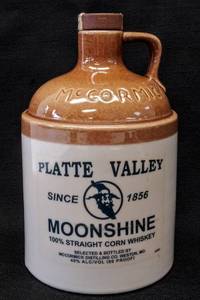 lot 9604 image: Vintage Platte Valley McCormick Moonshine Jug