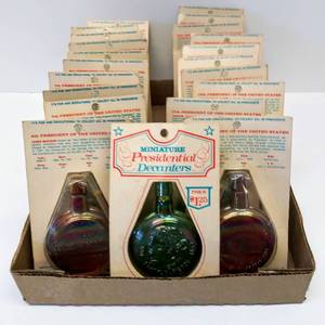 lot 9607 image: Miniature Presidential Decanter Bottles  Iridescent Glass & Original Packages  21 Total