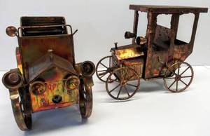 lot 9616 image: Vintage Metal Car Music Boxes