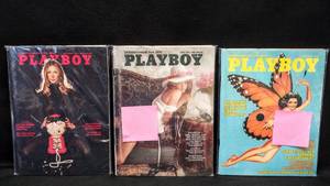 lot 9635 image: 3 Vintage Playboy Magazines  August 1976, April 1974, & November 1972  In Plastic Bag