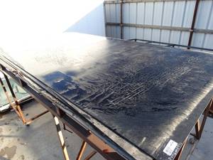 lot 3361 image: 4 sheets of plastic or rubber.
