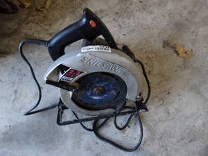 lot 3404 image: Skilsaw 7 14 circular saw.