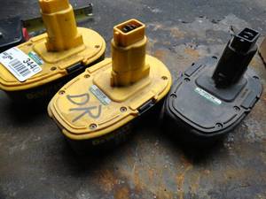 lot 3440 image: 3 Dewalt 18v batteries.