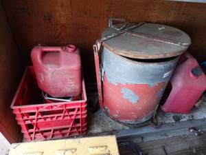 lot 3388 image: Gas cans & flammable trash can.