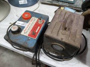 lot 3646 image: International 601 weed chopper electric fencer & Silver beauty automatic reset circuit breaker