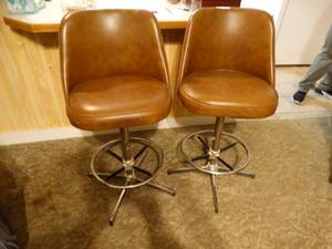 lot 9840 image: Pair of Brown Bucket Seat Stools