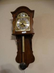 lot 9843 image: Howard Miller Wall Clock