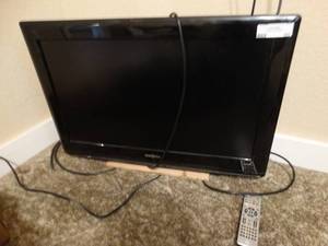 lot 55 image: Insignia LCD TVDVD Player