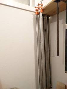 lot 232 image: Lot of 4 long pipe style clamps