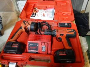 lot 308 image: Milwaukee cordless drill & flashlight set w 2 batteries, charger & case