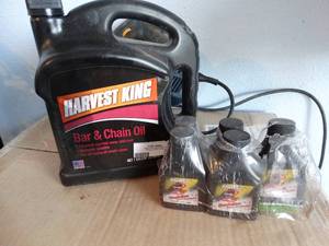 lot 356 image: Bar & chain oil & 2 cycle oil