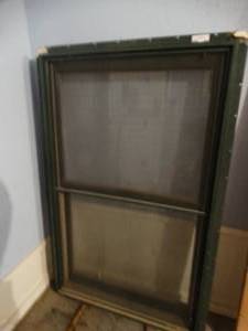lot 394 image: Aluminum & wood frame window