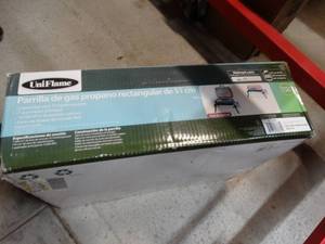 lot 428 image: UniFlame grill- New in box