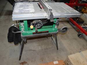 lot 444 image: Hitachi portable job site table saw w stand