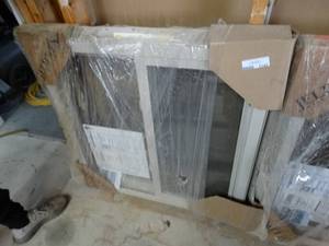 lot 1142 image: NEW Premium vinyl side load Window  34x33 12