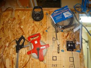 lot 1243 image: 300ft tape & misc on wall above toolbox