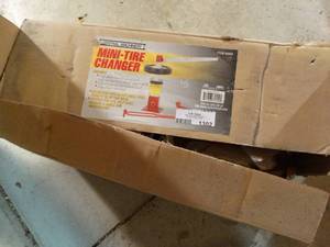 lot 1302 image: Mini tire changer inbox
