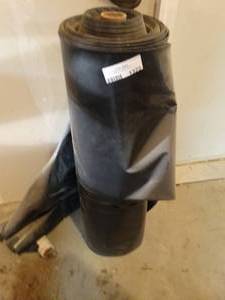 lot 1322 image: Large roll of black plastic
