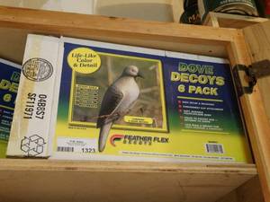 lot 1323 image: 2 boxes of dove decoys