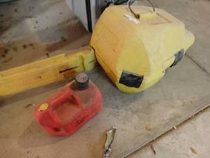 lot 1337 image: Chainsaw case & gas can
