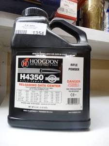lot 1354 image: Partial container of Hodgdon rifle powder