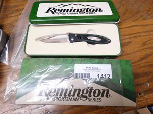 lot 1412 image: Remington sportsman series pocket knife in metal case