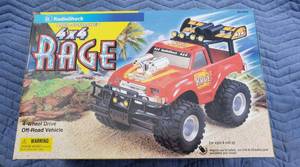lot 5007 image: Radioshack Rage Rc Truck 4x4 - 49mhz With Remote No Charger Parts Untested as is