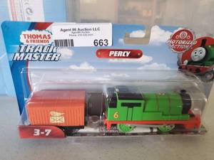 lot 663 image: Fisher-Price Thomas &amp Friends TrackMaster Motorized Percy Engine- NEW Old Stock- Sealed