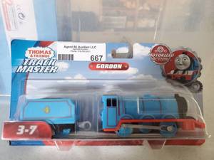 lot 667 image: Fisher-Price Thomas &amp Friends TrackMaster Motorized Gordon Engine- NEW Old Stock- Sealed