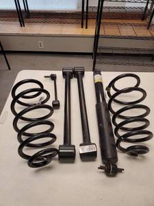 lot 9707 image: Coil Springs and Other Parts- Jeep Wrangler- Appear New With Tags