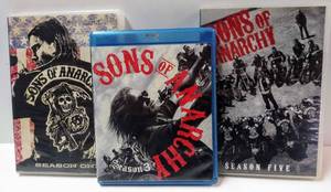 lot 102 image: Sons Of Anarchy  Seasons 1 & 5 on DVDs  Season 3 on Blue Ray