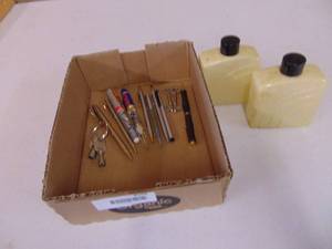 lot 4166 image: Vintage Listerine Bottles - Pens and Keys