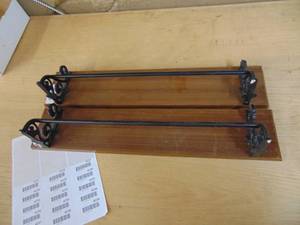 lot 4224 image: Pair of cast towel Racks mounted on wood